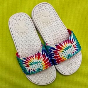 Tie-dye and white Puma Slides
